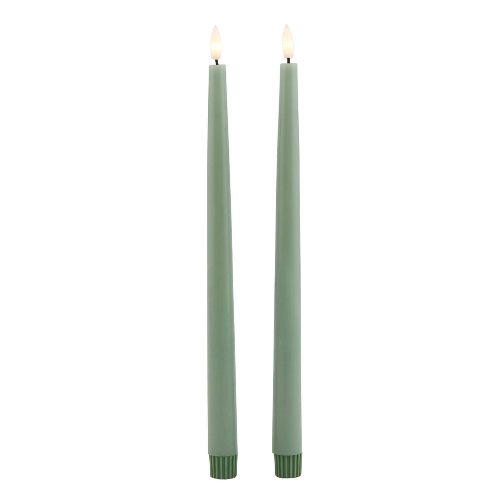 Sage green LED candle with realistic wax texture, flickering flame-free ambiance for elegant home decor. by RoomLondon at brixbailey.com
