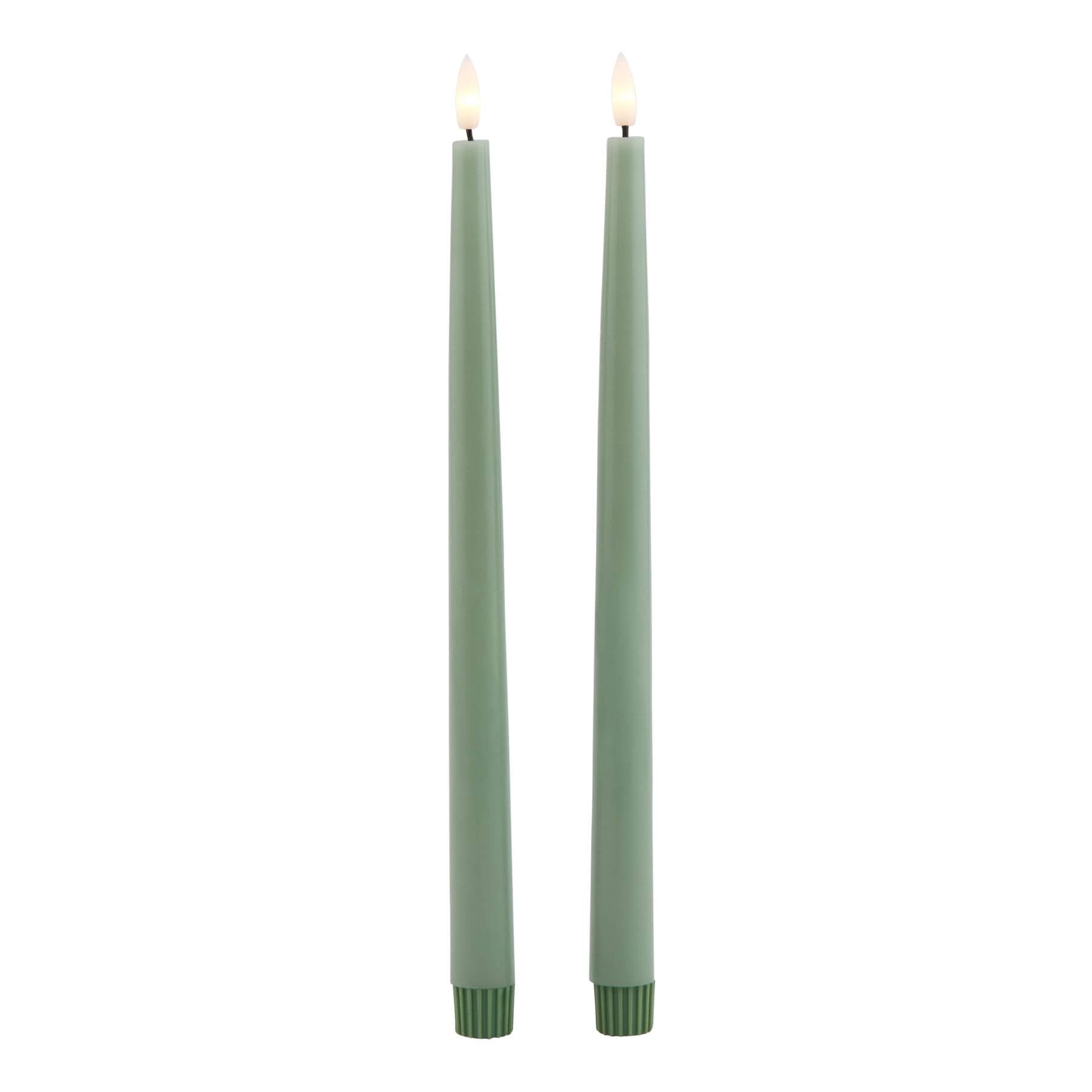 Sage green LED candle with realistic wax texture, flickering flame-free ambiance for elegant home decor. by RoomLondon at brixbailey.com