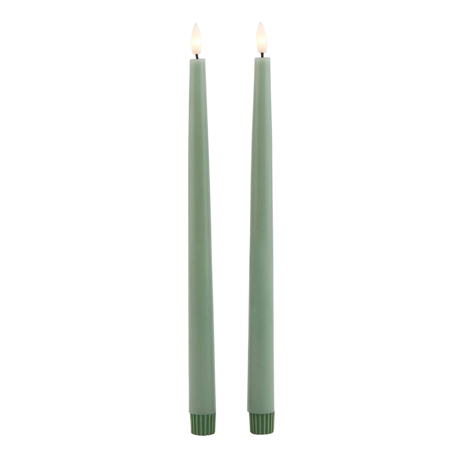 Sage green LED candle with realistic wax texture, flickering flame-free ambiance for elegant home decor. by Sostter at brixbailey.com