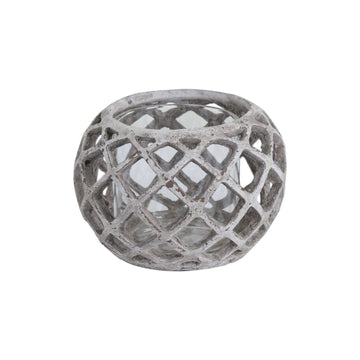 Handcrafted ceramic hurricane lantern with geometric lattice design, casting mesmerizing light patterns in neutral stone finish. by Sostter at brixbailey.com
