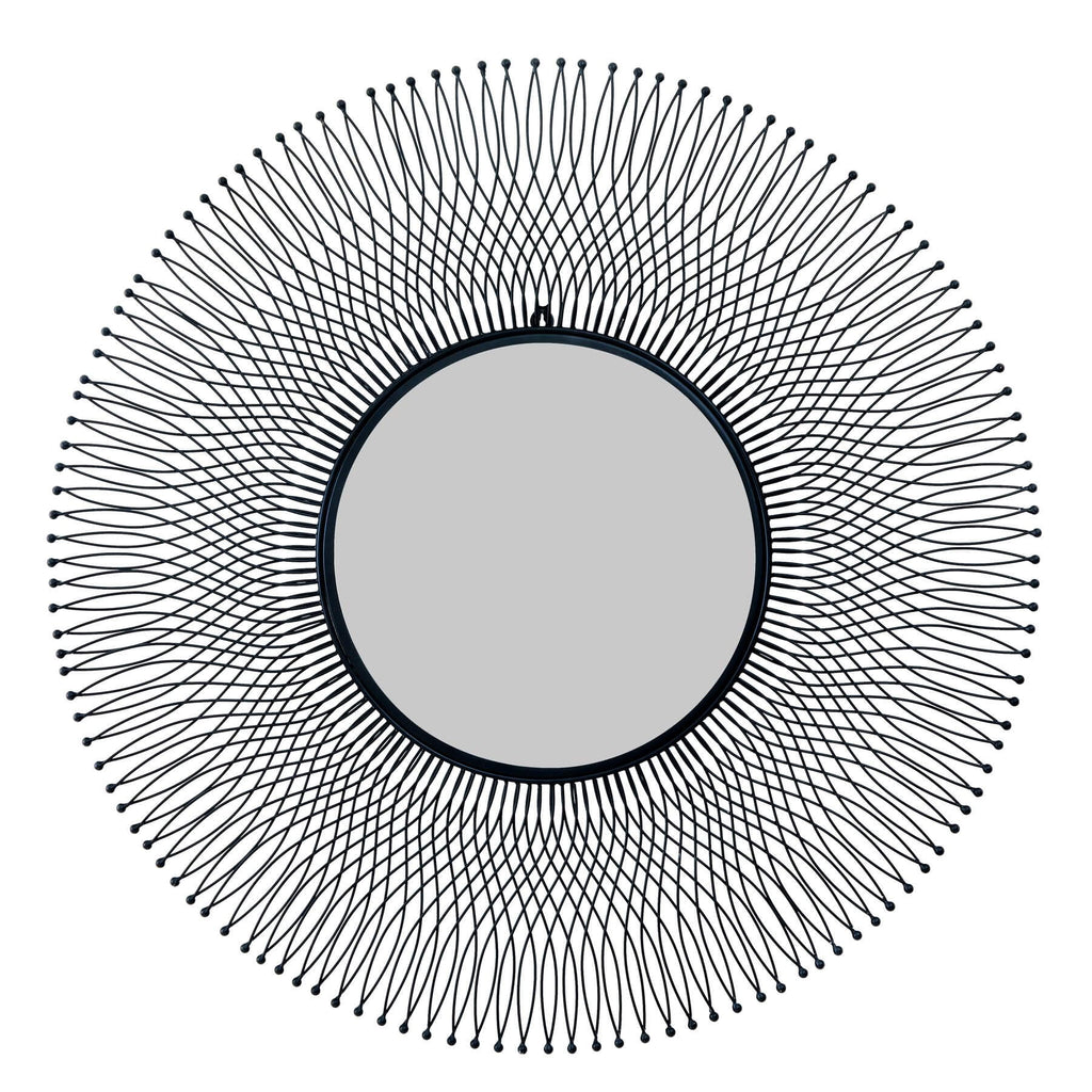 Black geometric wire mirror with industrial design, 109cm circular tempered glass, casting dynamic shadows in modern interiors by Sostter at brixbailey.com