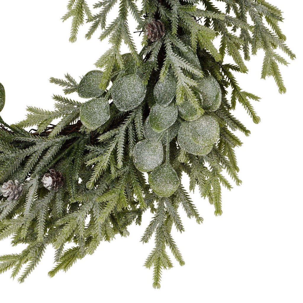 Frosted pine and eucalyptus winter wreath with silver-dusted needles and blue-green accents, 50cm diameter by Sostter at brixbailey.com