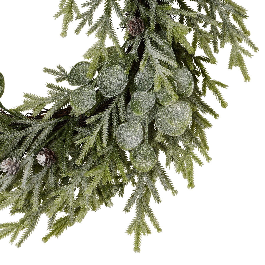 Frosted pine and eucalyptus winter wreath with silver-dusted needles and blue-green accents, 50cm diameter by Sostter at brixbailey.com
