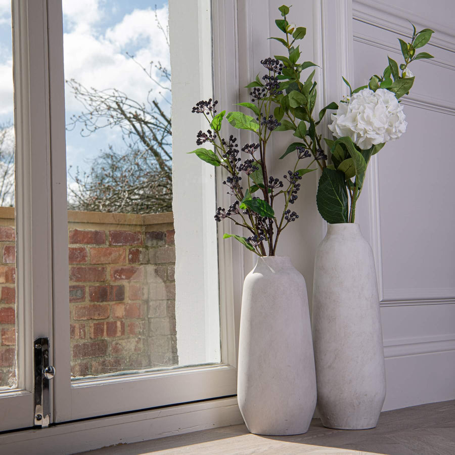 Darcy Ople Vase: slender ceramic vase with natural stone finish, perfect for floral arrangements in modern or rustic decor by Sostter at brixbailey.com