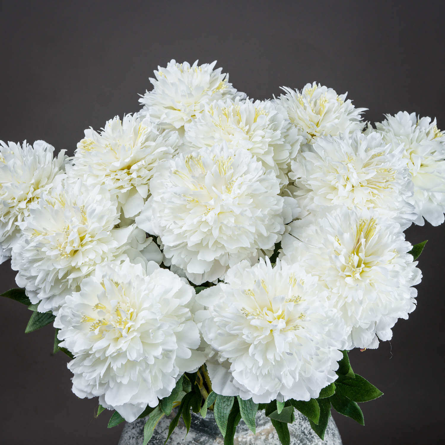 Handcrafted white artificial peony with layered petals, realistic texture, and natural tonal variations for home decor. by Sostter at brixbailey.com