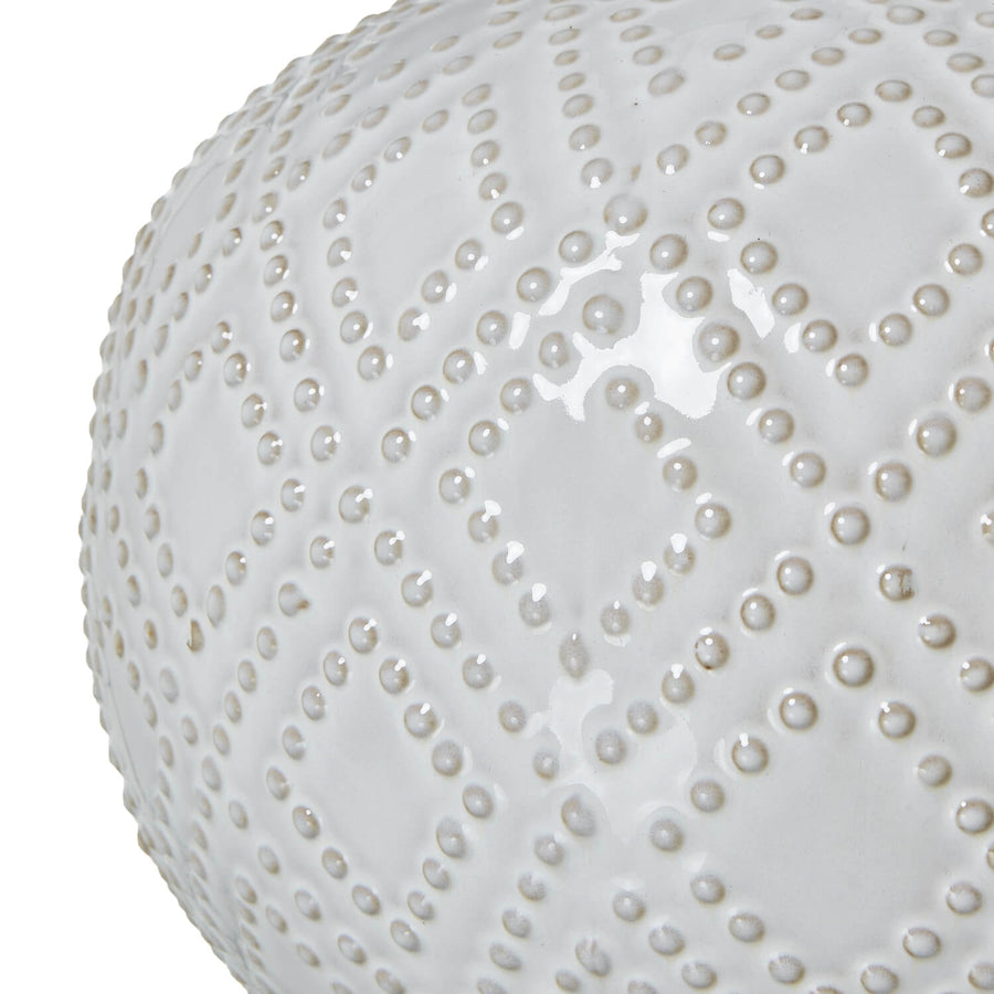 Handcrafted white ceramic lamp with beaded detail and linen shade, perfect for coastal or boho home decor. by Sostter at brixbailey.com