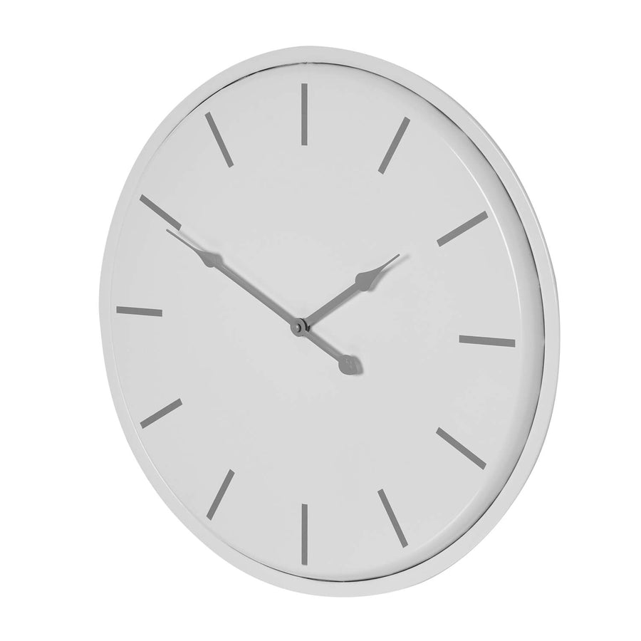 White minimalist metal wall clock, contemporary industrial design, 49cm round, sleek home decor statement piece by Sostter at brixbailey.com
