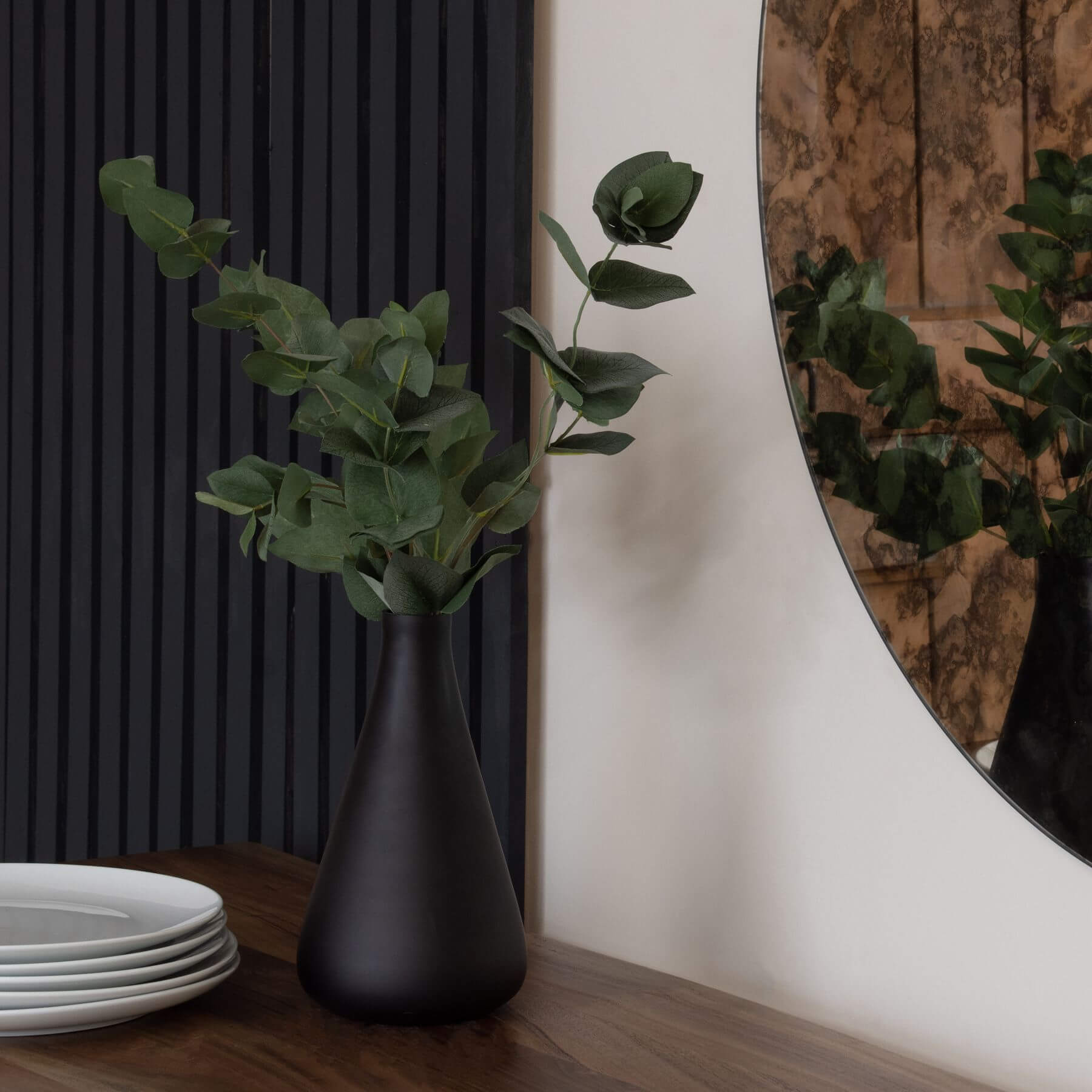 Lifelike artificial eucalyptus stems in silver-sage green, perfect for vase arrangements and home decor. by RoomLondon at brixbailey.com