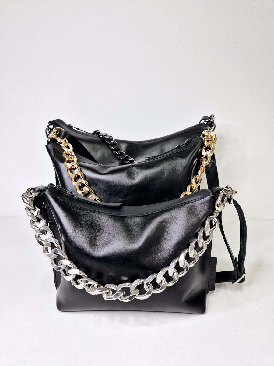 Classic Black Handbag with Metallic Accents – Timeless & Versatile by Zelma Kraft at brixbailey.com