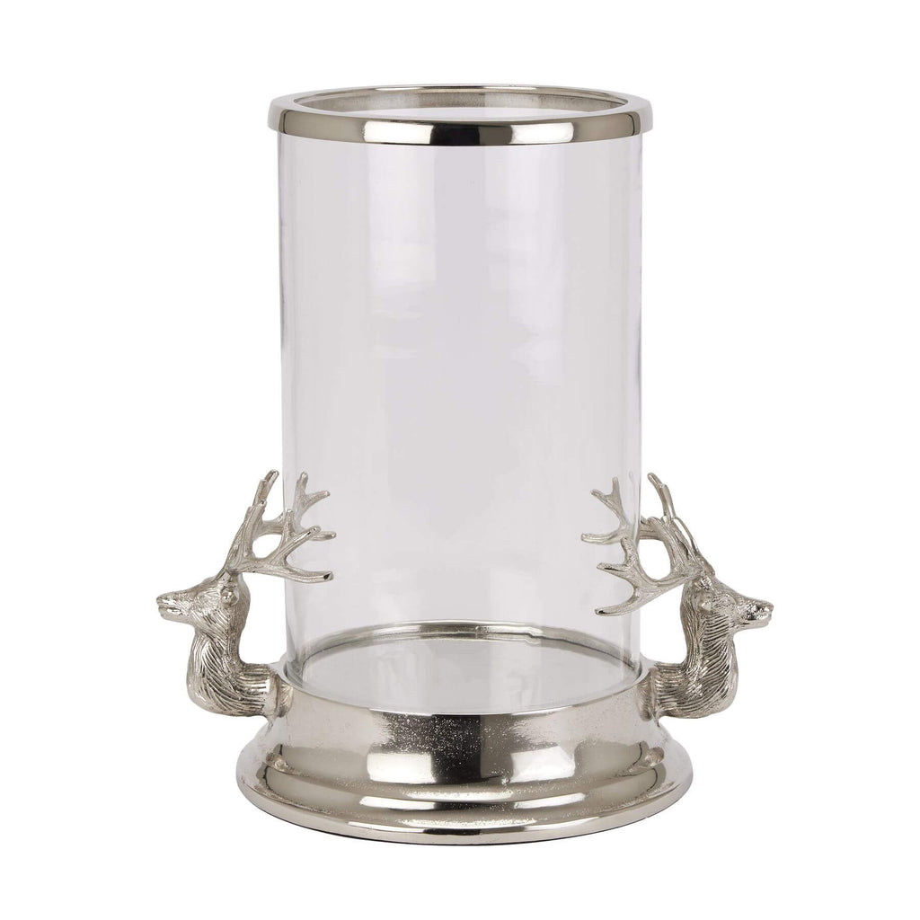 Silver Stag Heads Hurricane Lantern with glass cylinder, polished metal finish, and intricate stag accents for home decor by Sostter at brixbailey.com