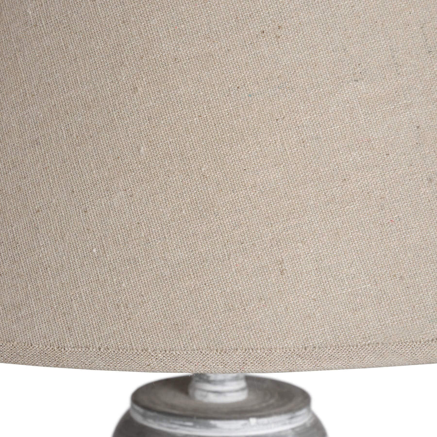 Handcrafted Ithaca floor lamp with whitewashed wood base and linen shade, warm beige lighting for home decor. by Sostter at brixbailey.com