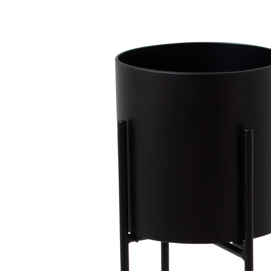 Matte black metal cylindrical planter with geometric base, 84cm tall, modern home decor for plants by Sostter at brixbailey.com