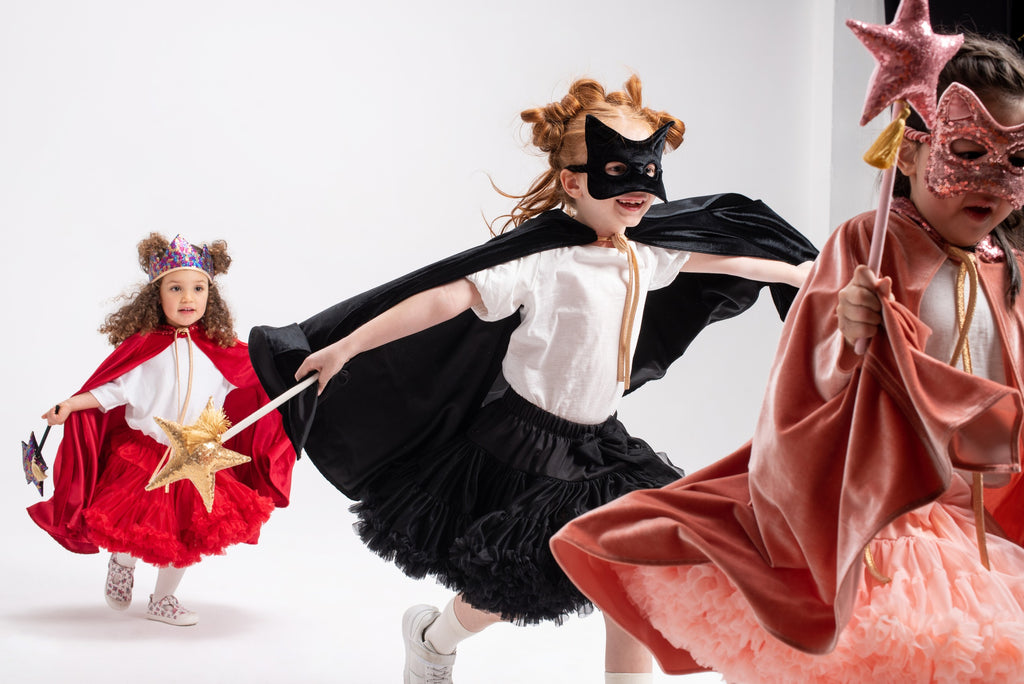 handmade black velvet cat mask with shimmering sequins for a playful child