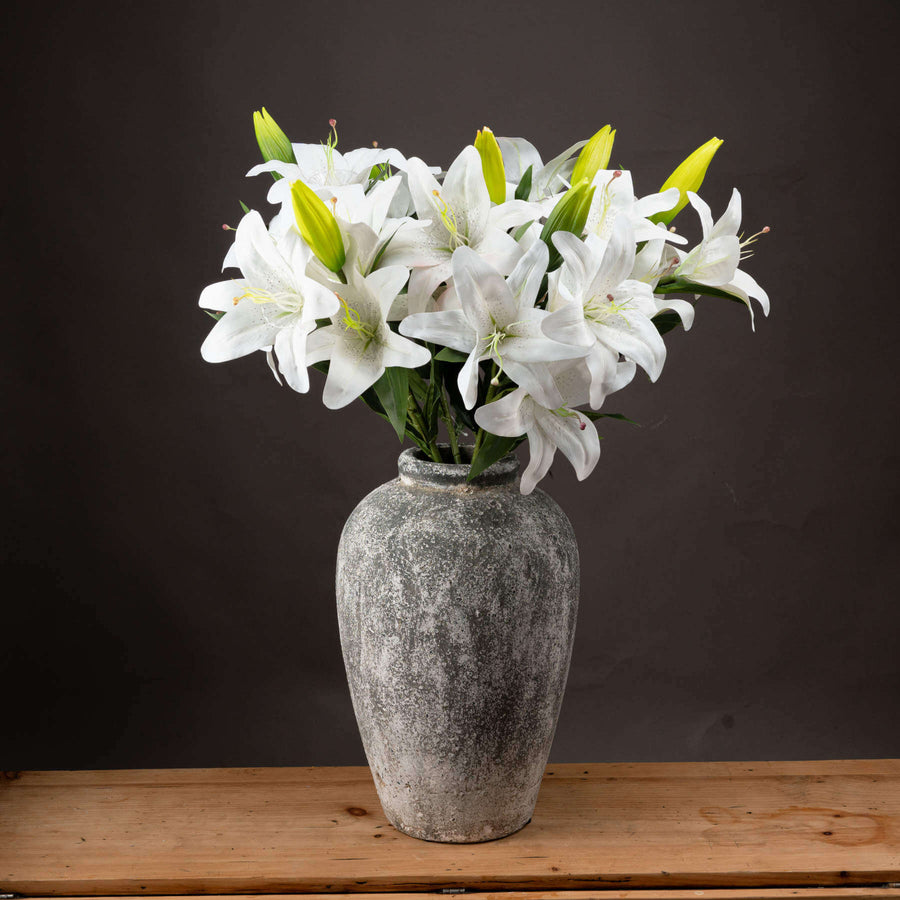 Premium white artificial lily stems with 3 realistic blooms, perfect for home decor  by Sostter at brixbailey.com