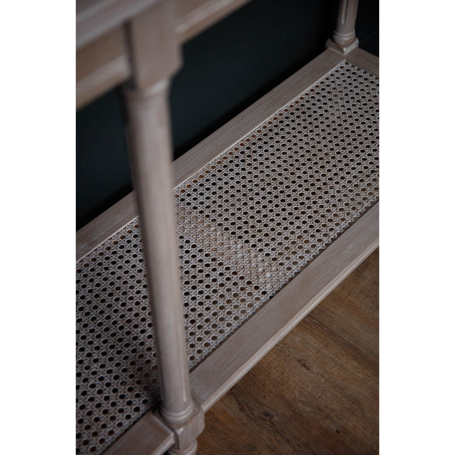 Modern grey rattan console table with handwoven texture and tapered legs, 160cm wide. by Sostter at brixbailey.com