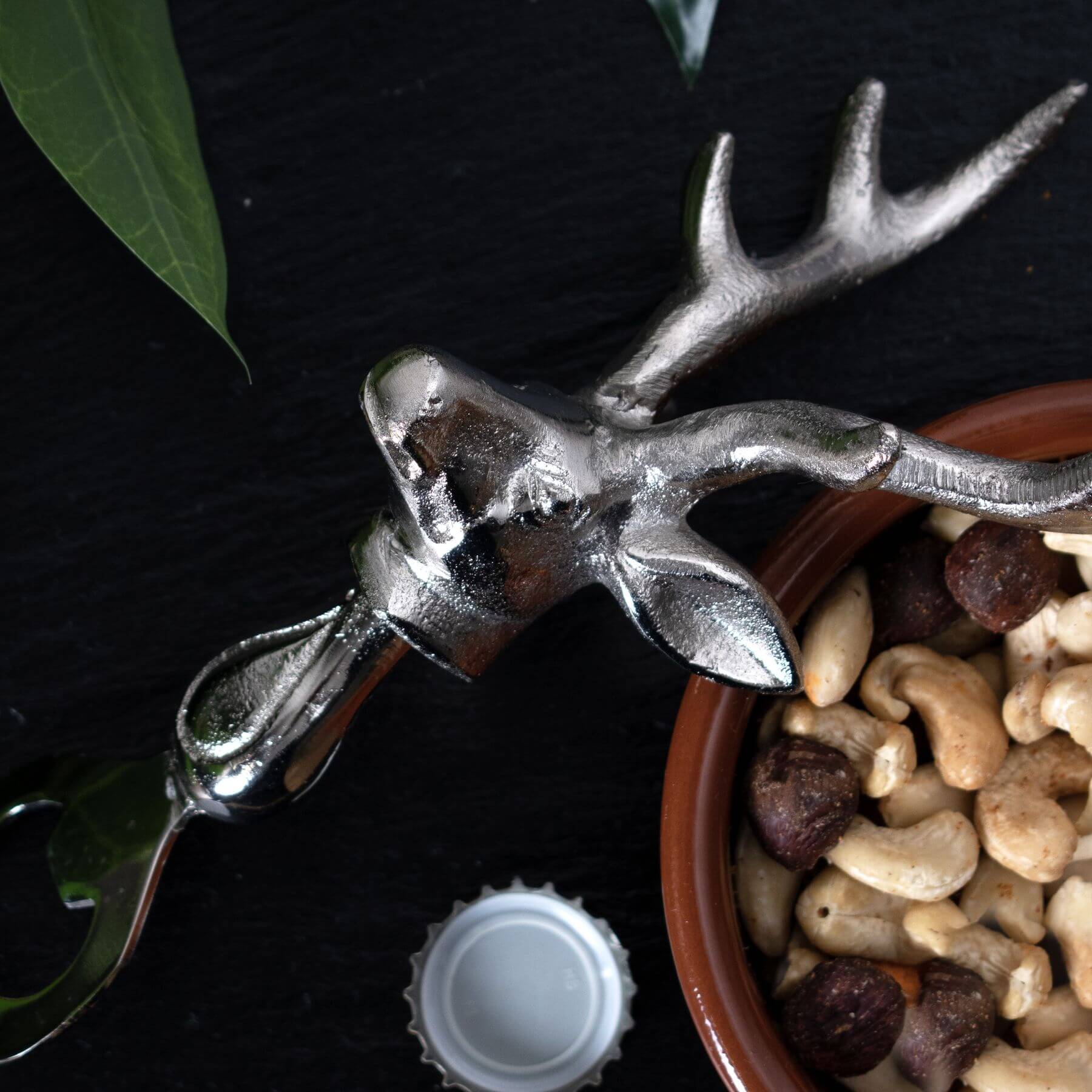 Silver nickel stag head bottle opener with polished metal finish and ergonomic grip for barware by Sostter at brixbailey.com