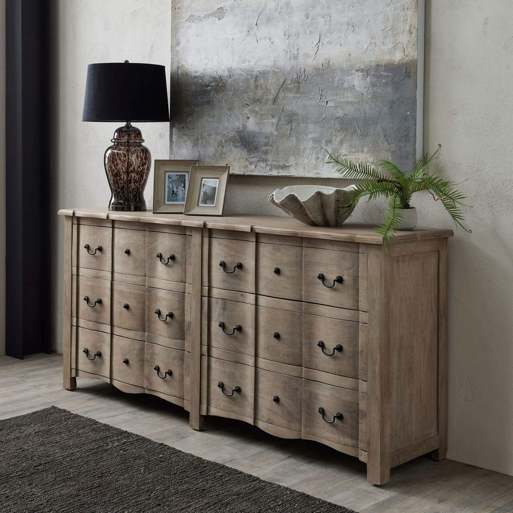 French Provincial chest with black iron handles, washed wood finish, six spacious drawers, and solid hardwood construction. by Sostter at brixbailey.com