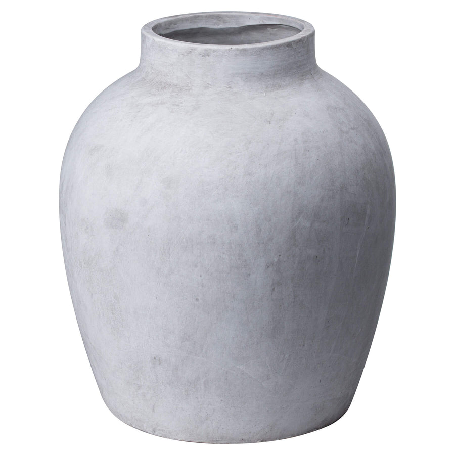 Handcrafted stoneware vase in natural hue with textured surface, perfect for modern floral arrangements or standalone decor. by Sostter at brixbailey.com