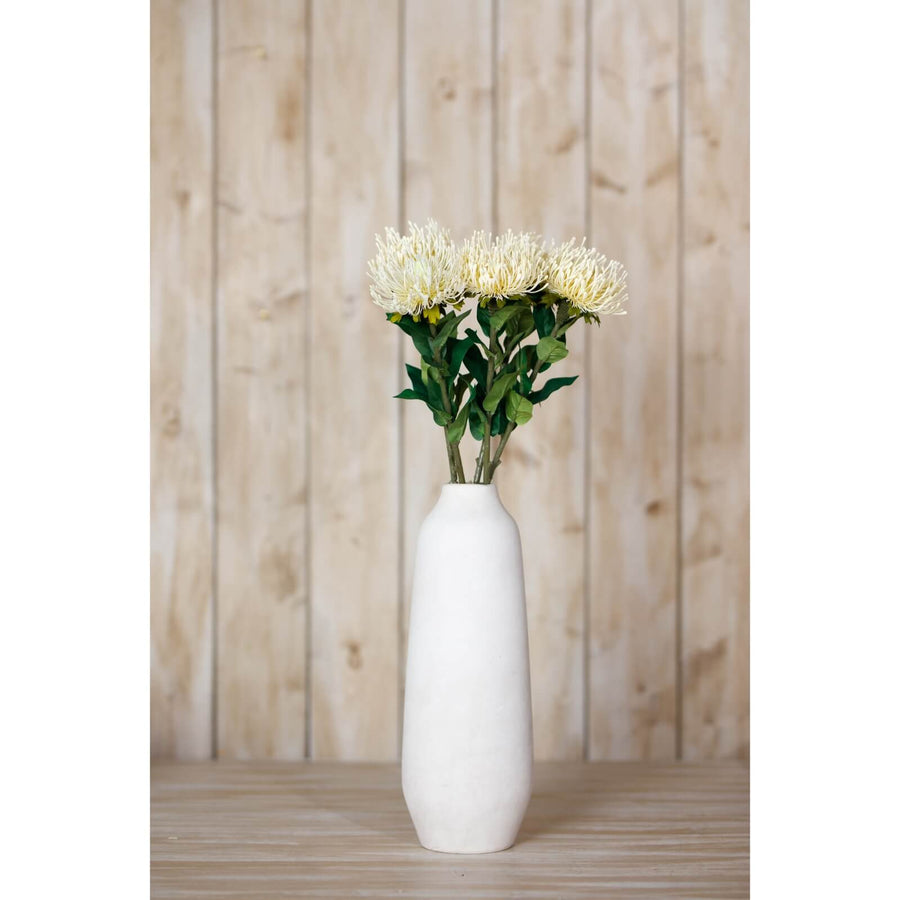 Cream Protea Lorea artificial stem with lifelike spherical bloom and lush foliage, soft cream color, 73 cm tall by Sostter at brixbailey.com
