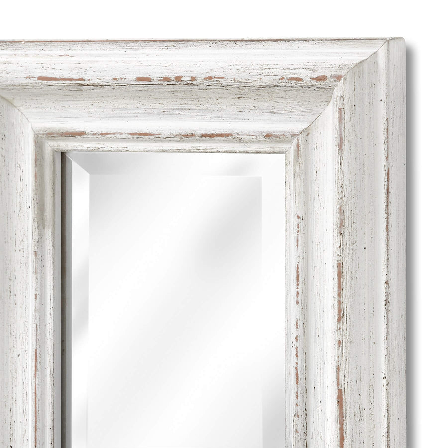 Antique white narrow wall mirror with delicate frame, ideal for hallways and small spaces, enhances light and expands rooms visually. by Sostter at brixbailey.com