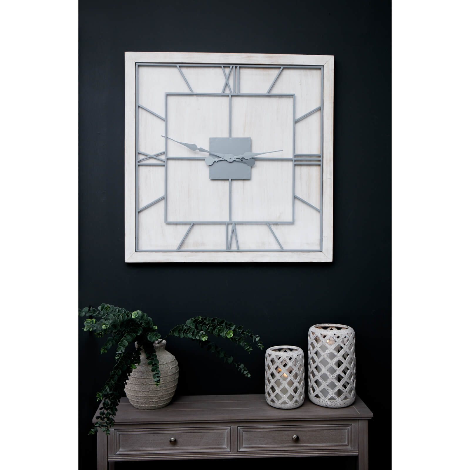 White wooden square wall clock with grey metal Roman numerals and skeleton-style face for modern farmhouse decor by Sostter at brixbailey.com