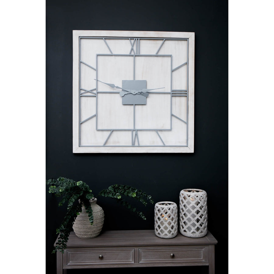White wooden square wall clock with grey metal Roman numerals and skeleton-style face for modern farmhouse decor by Sostter at brixbailey.com