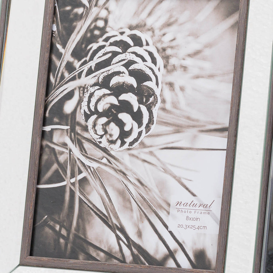 Mirror-edged wood photo frame in rich brown, showcasing 8x10 photo with elegant beveled border and natural wood grain. by Sostter at brixbailey.com