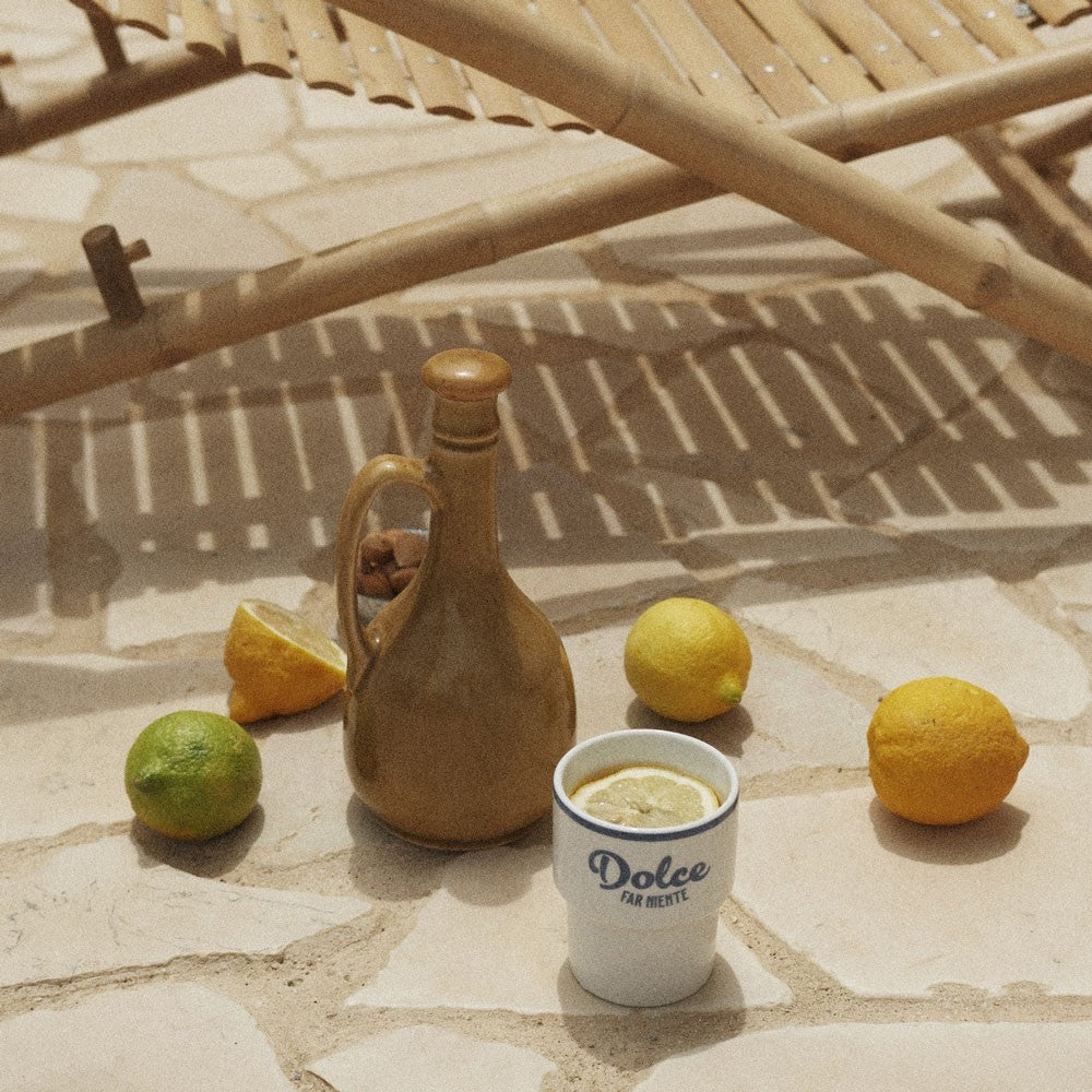 elegant dolce far niente ceramic mug in a refined still life with soft morning light