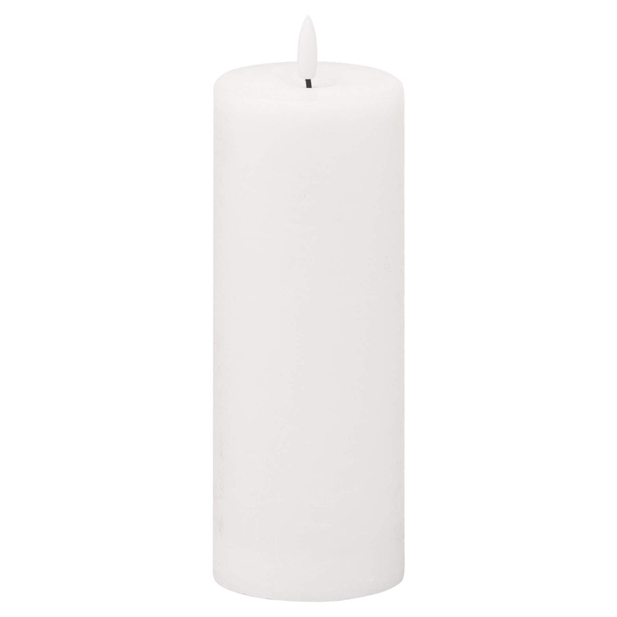 White flameless LED candle with realistic flicker effect, wax-like finish, 20cm tall, safe battery-operated ambiance lighting by Sostter at brixbailey.com