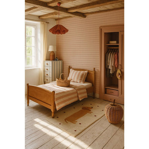 a bold, close-up view of the pink and cream checkered wallpaper pattern with sharp, defined lines