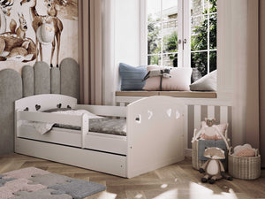 bold white julia kids bed with heart cutouts and safety guardrail