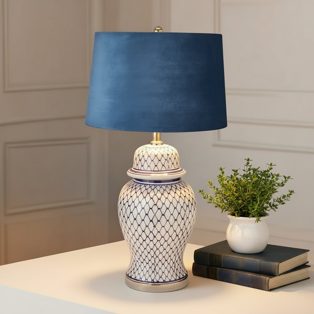 Blue and white ceramic ginger jar lamp with hand-painted motifs and plush velvet shade, 76cm tall   

âœ… **Keywords included:** ceramic, ginger jar lamp, blue and white, hand-painted, velvet shade  
âœ… **Clear description:** Visually details the lampâ€™s materials, colors, and distinctive features  
âœ… **SEO & accessibility optimized:** Concise yet descriptive for both search engines and screen readers by Sostter at brixbailey.com