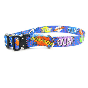 soft blue graffiti dog collar with a secure metal buckle on a cozy bed