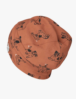 a soft cotton beanie for a child, shown in gentle morning light, offering cozy comfort for little ears