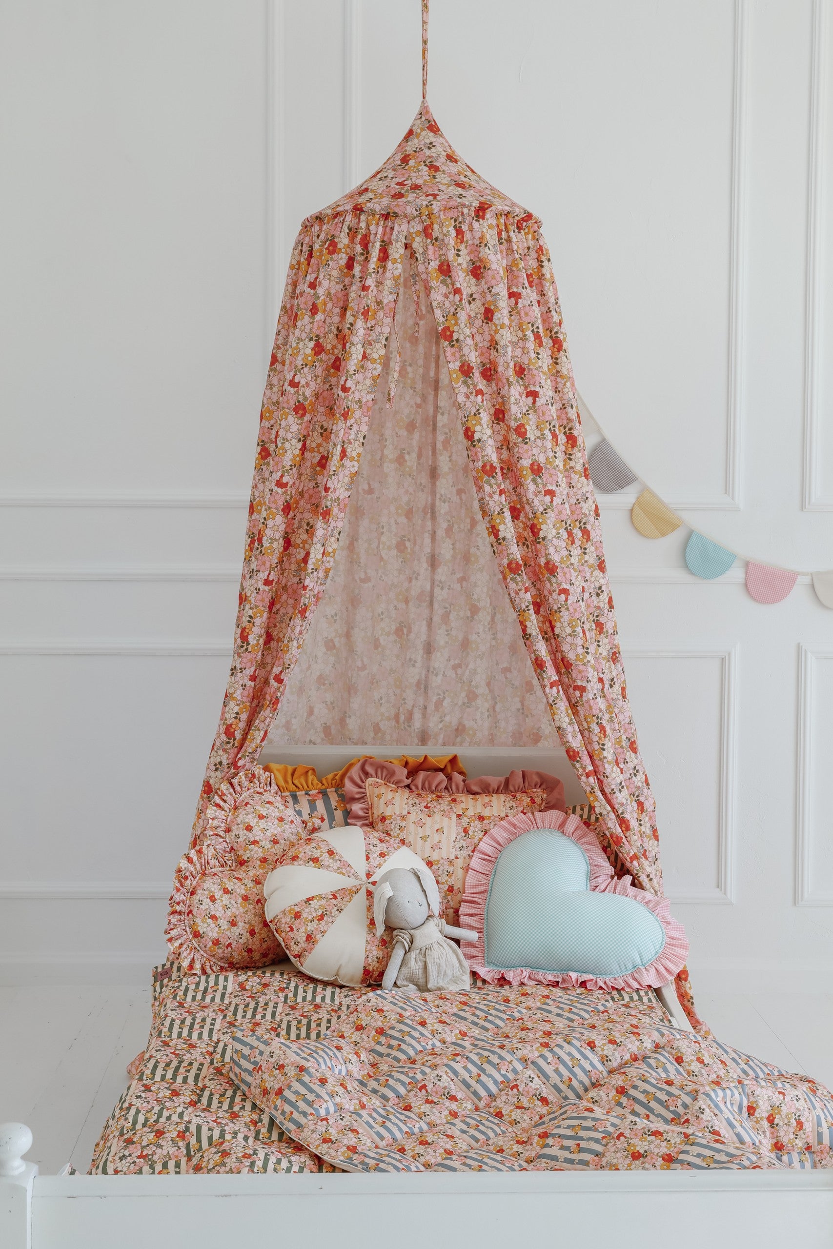 playful summer garden quilted blanket and pillow set with vibrant patchwork patterns, perfect for kids' naps and play