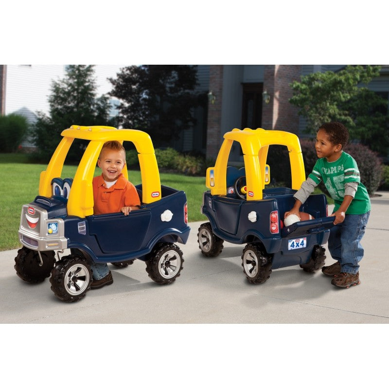 bold black and yellow cozy truck ride-on toy with a smiling front grill and open tailgate