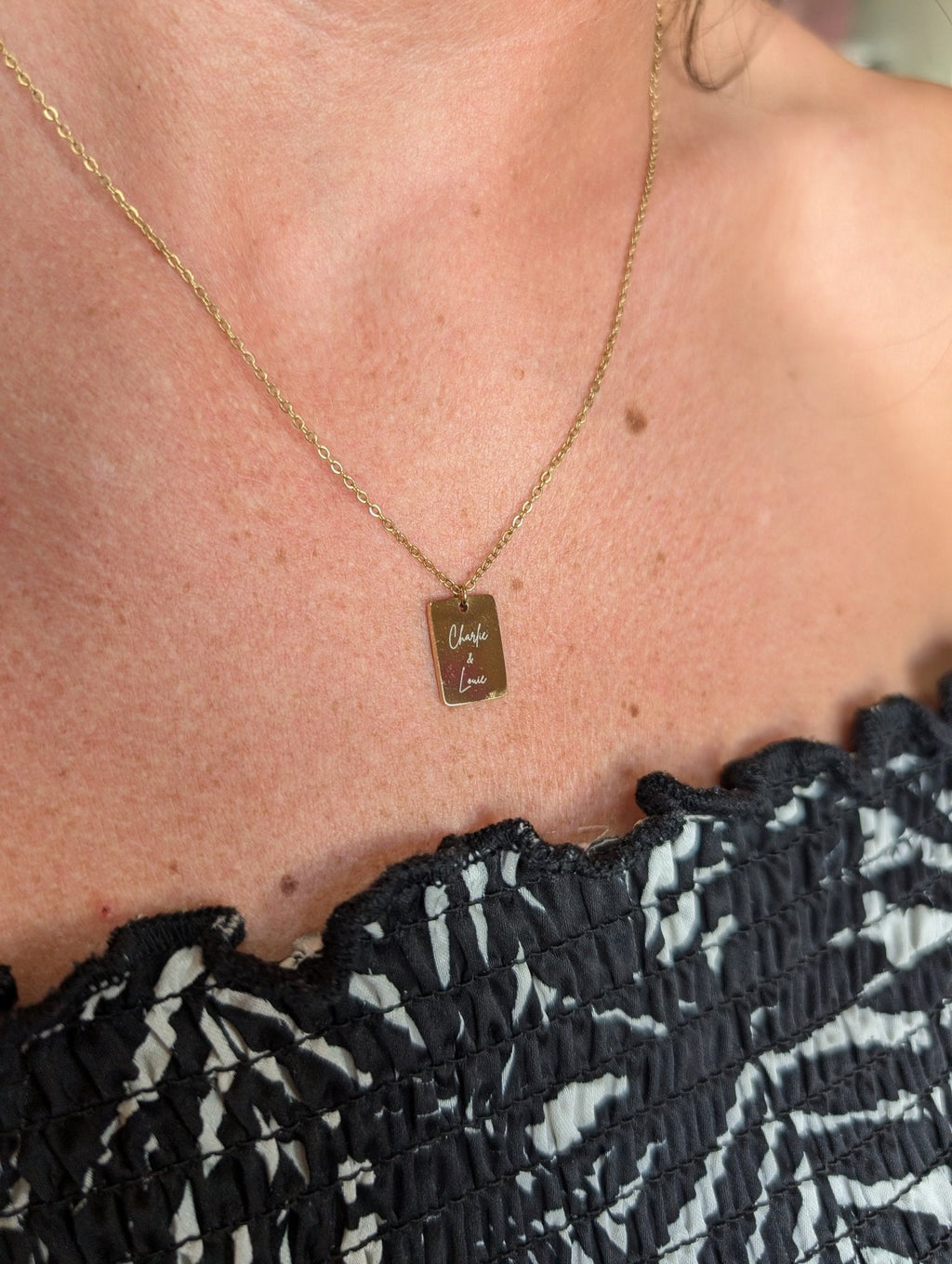 Custom engraved tiny tag necklace