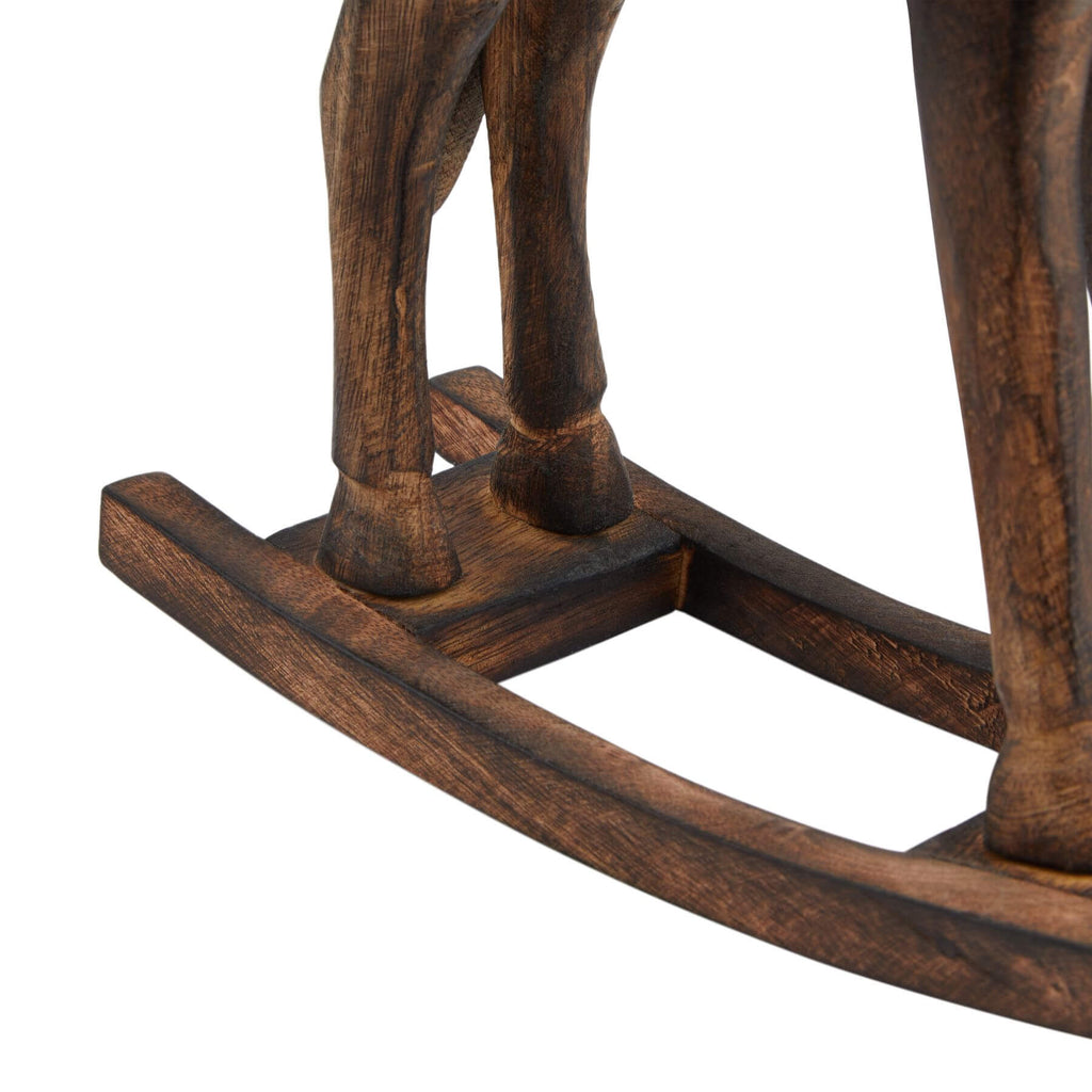 Natural wooden rocking horse for kids, heirloom-quality nursery decor with smooth sanded surfaces and warm brown finish. by RoomLondon at brixbailey.com