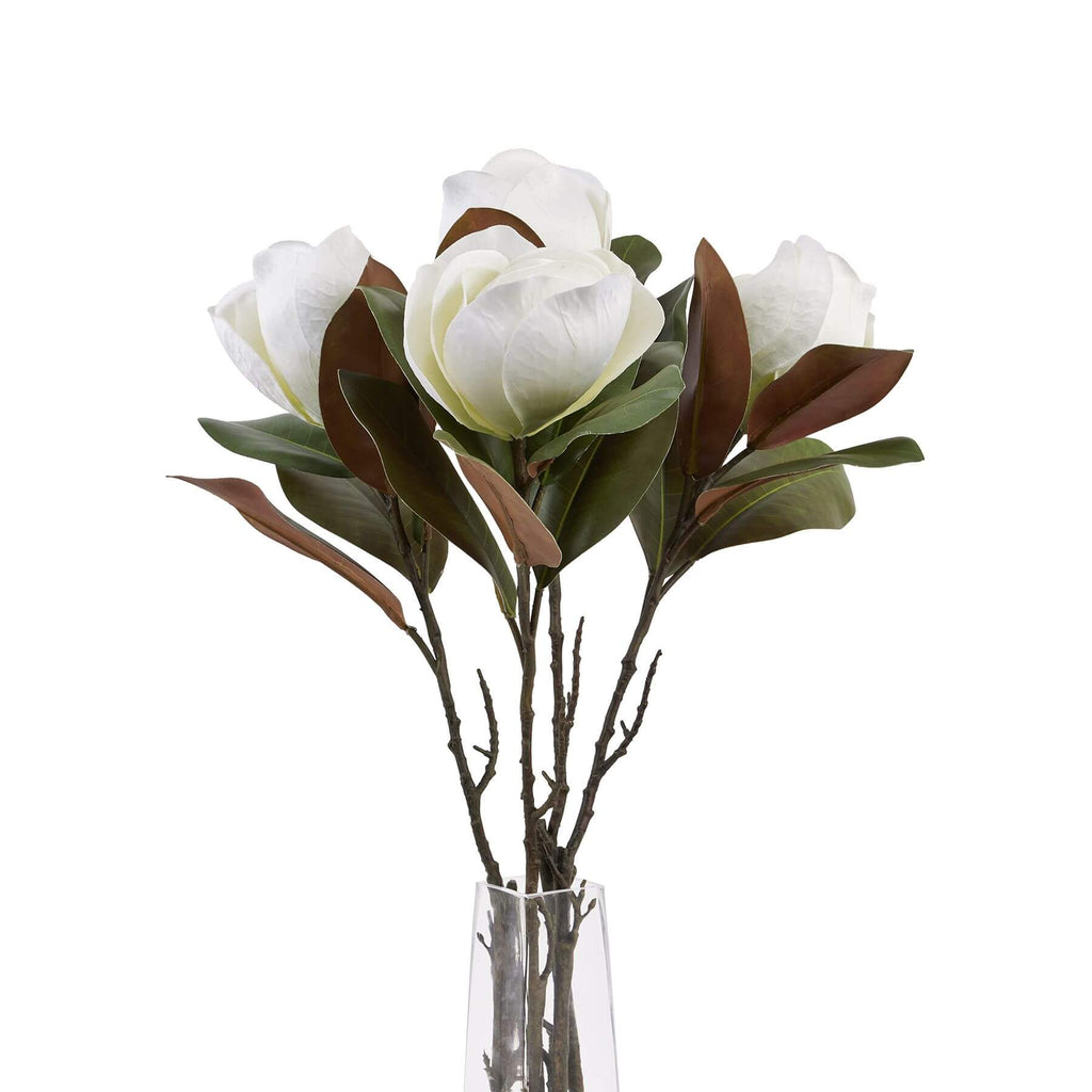White magnolia artificial stems with lifelike petals, perfect for home decor arrangements, made of premium plastic. by RoomLondon at brixbailey.com
