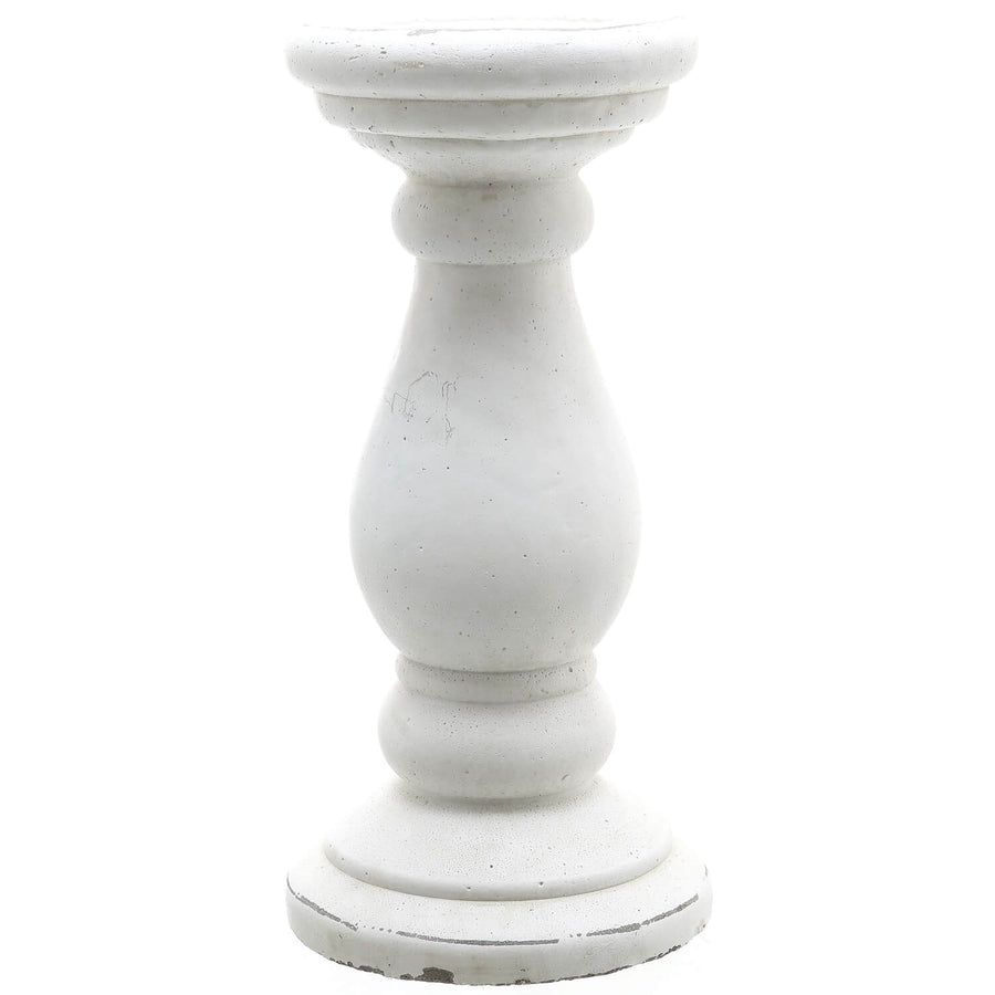 Handcrafted white ceramic candle holder with matte finish and sculptural minimalist design for modern interiors. by Sostter at brixbailey.com