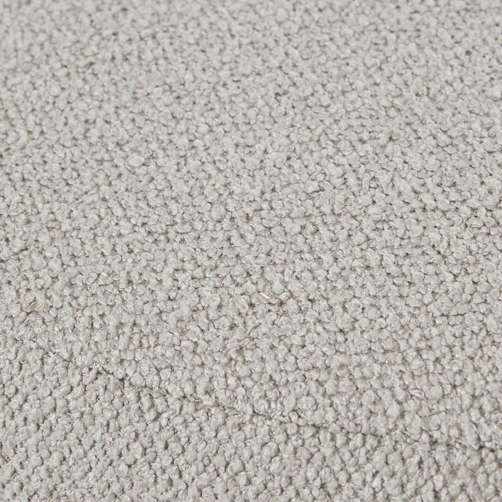 Plush Aspen swivel ottoman in neutral tone with hidden storage and 360-degree rotation by Sostter at brixbailey.com