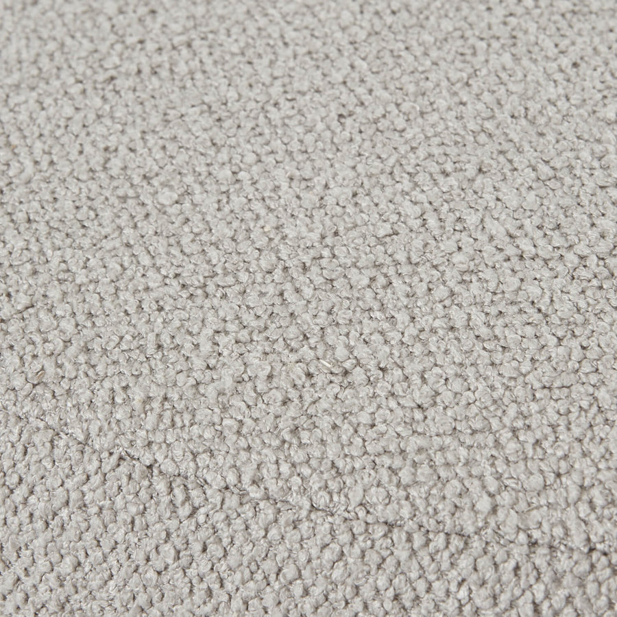 Plush Aspen swivel ottoman in neutral tone with hidden storage and 360-degree rotation by Sostter at brixbailey.com