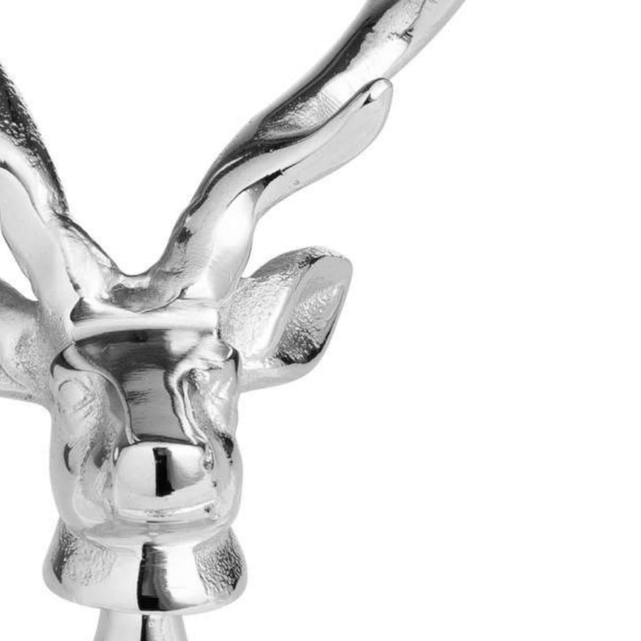 Silver nickel stag head bottle opener with polished metal finish, rustic barware accessory for whiskey lovers by Sostter at brixbailey.com