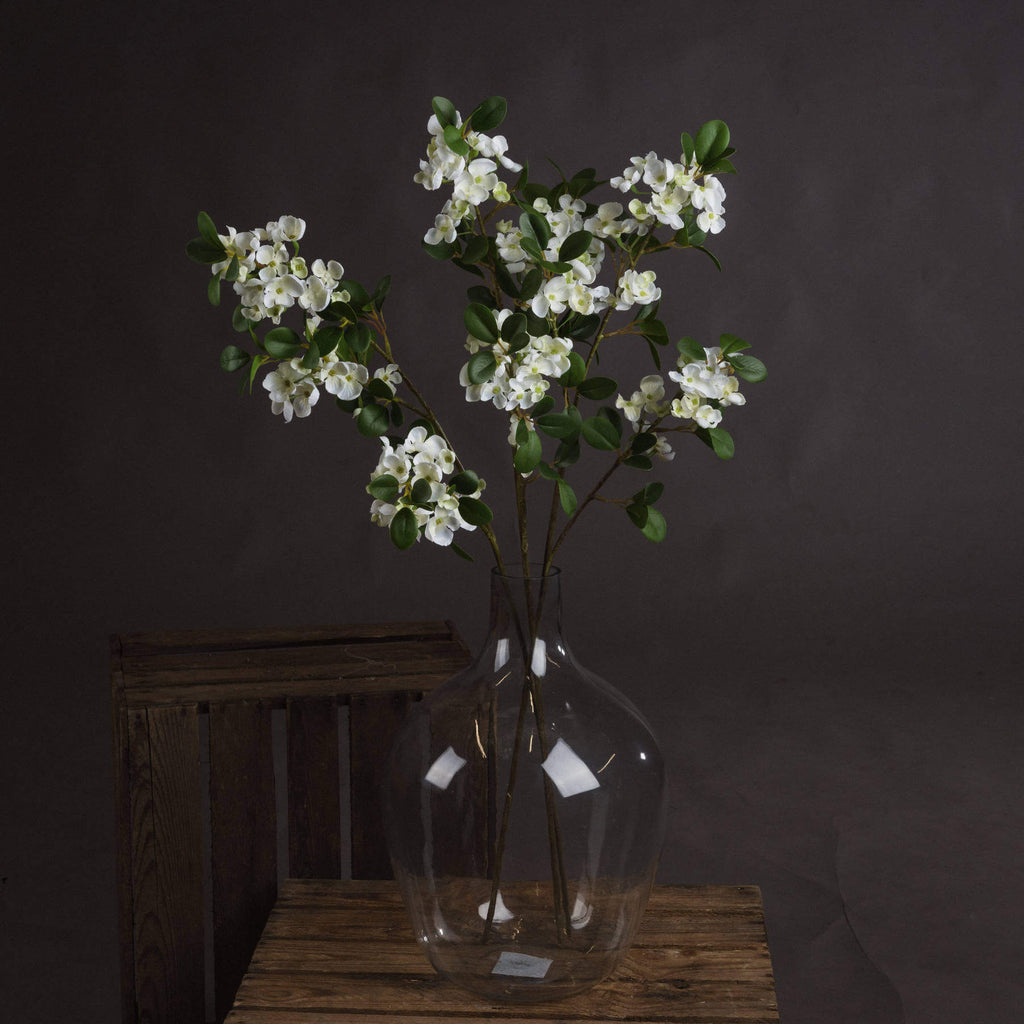 Realistic white mock orange blossom spray with delicate petals and leaves, perfect for home decor by Sostter at brixbailey.com