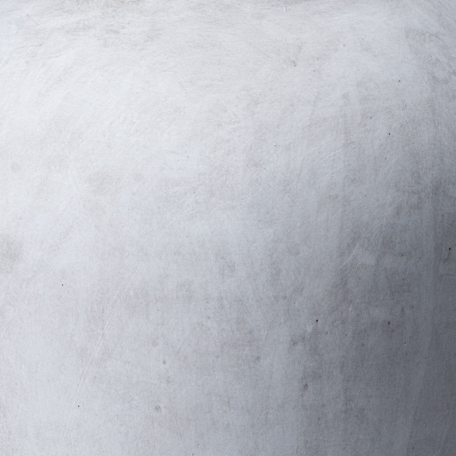 Handcrafted stoneware vase in natural hue with textured surface, perfect for modern home decor. by Sostter at brixbailey.com