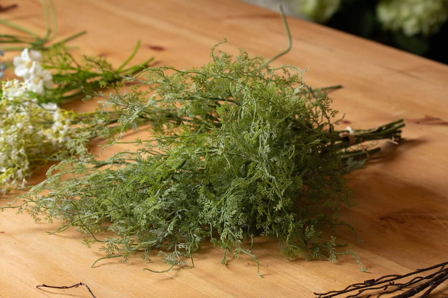 Lush artificial asparagus fern bunch in vibrant green, perfect for home decor or floral arrangements. by Sostter at brixbailey.com