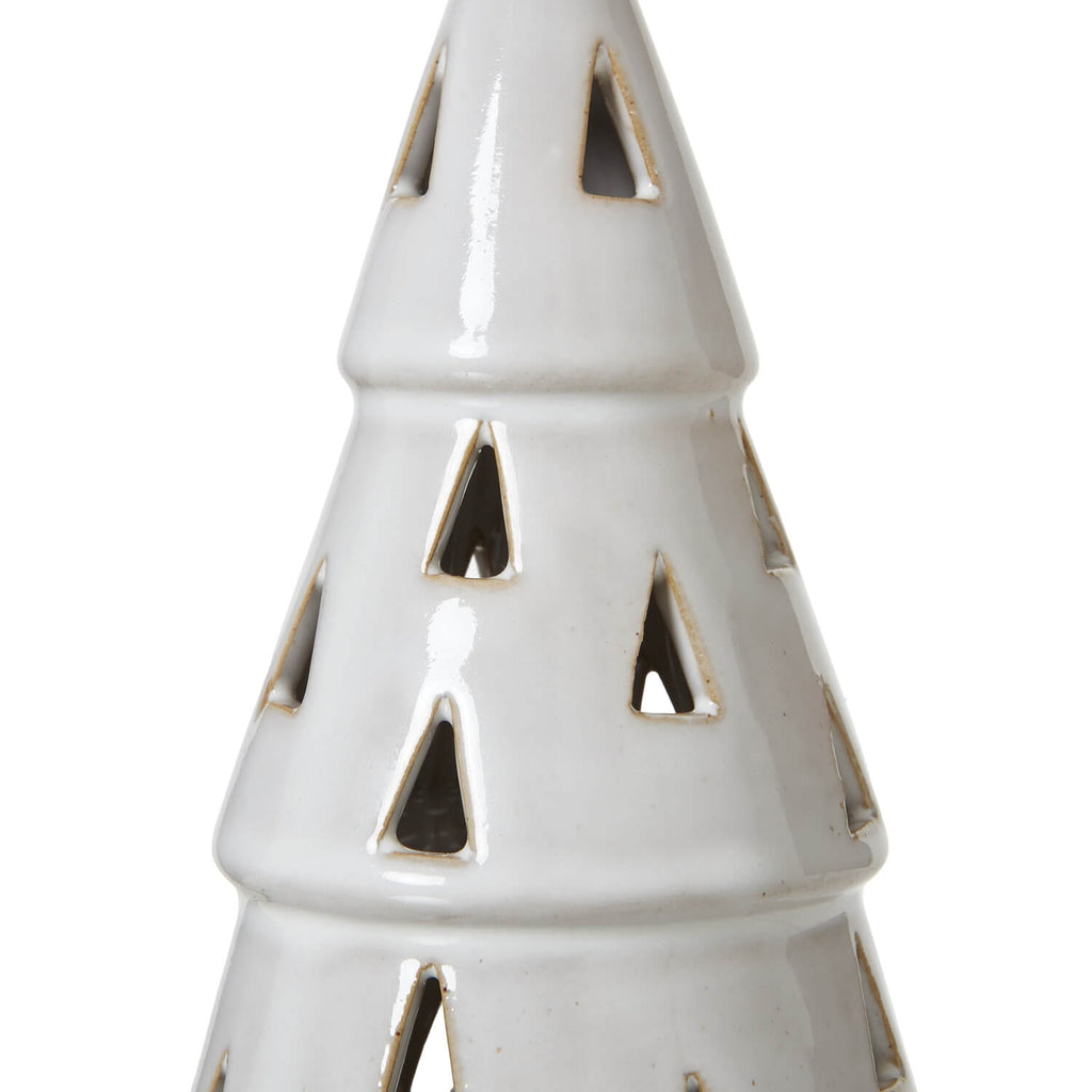 Handcrafted white ceramic LED light tree with geometric cut-outs, casting warm ambient glow for home decor by Sostter at brixbailey.com