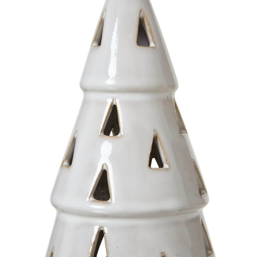 Handcrafted white ceramic LED light tree with geometric cut-outs, casting warm ambient glow for home decor by Sostter at brixbailey.com
