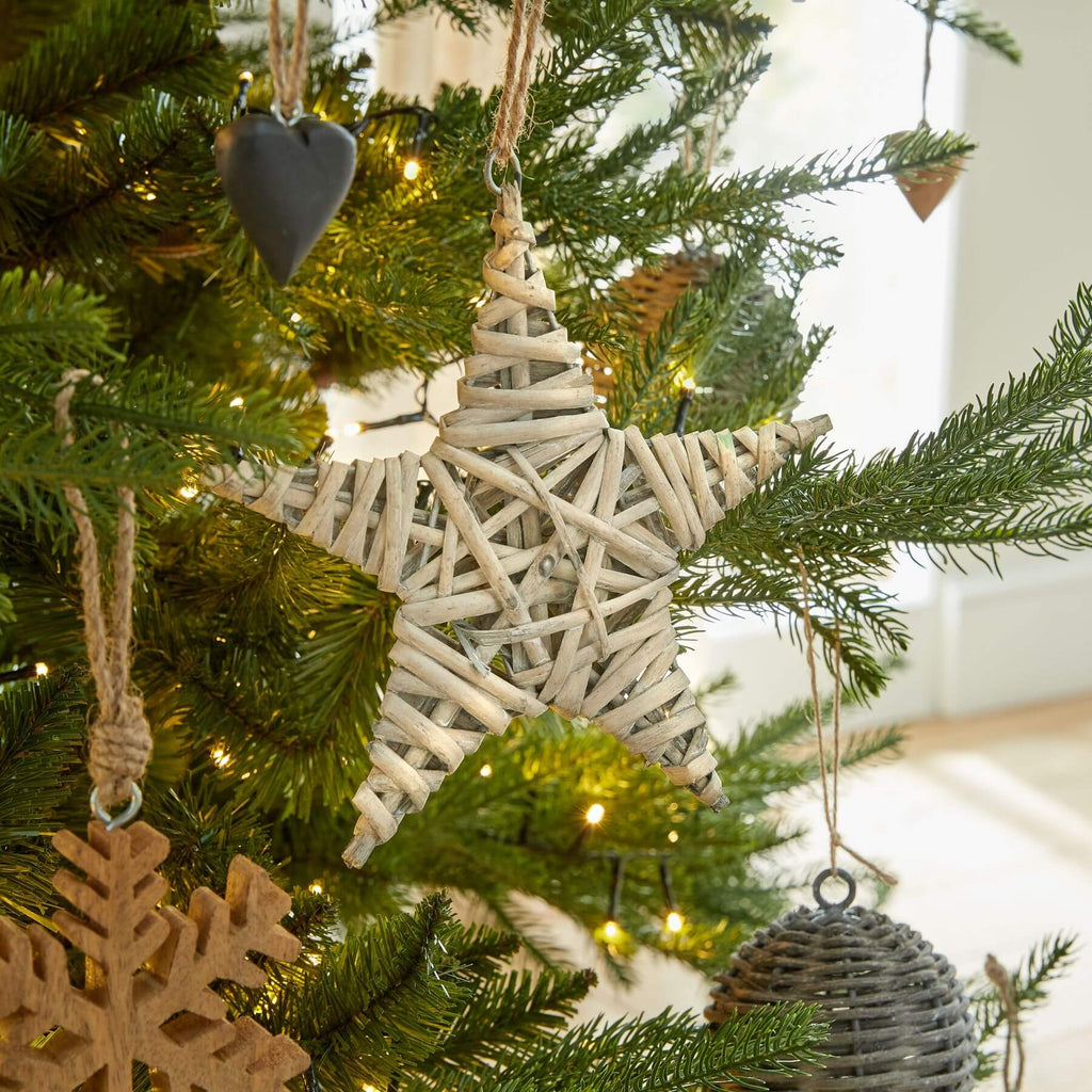 Handwoven natural wicker star ornament, rustic holiday decor with intricate woven texture, warm brown color by RoomLondon at brixbailey.com