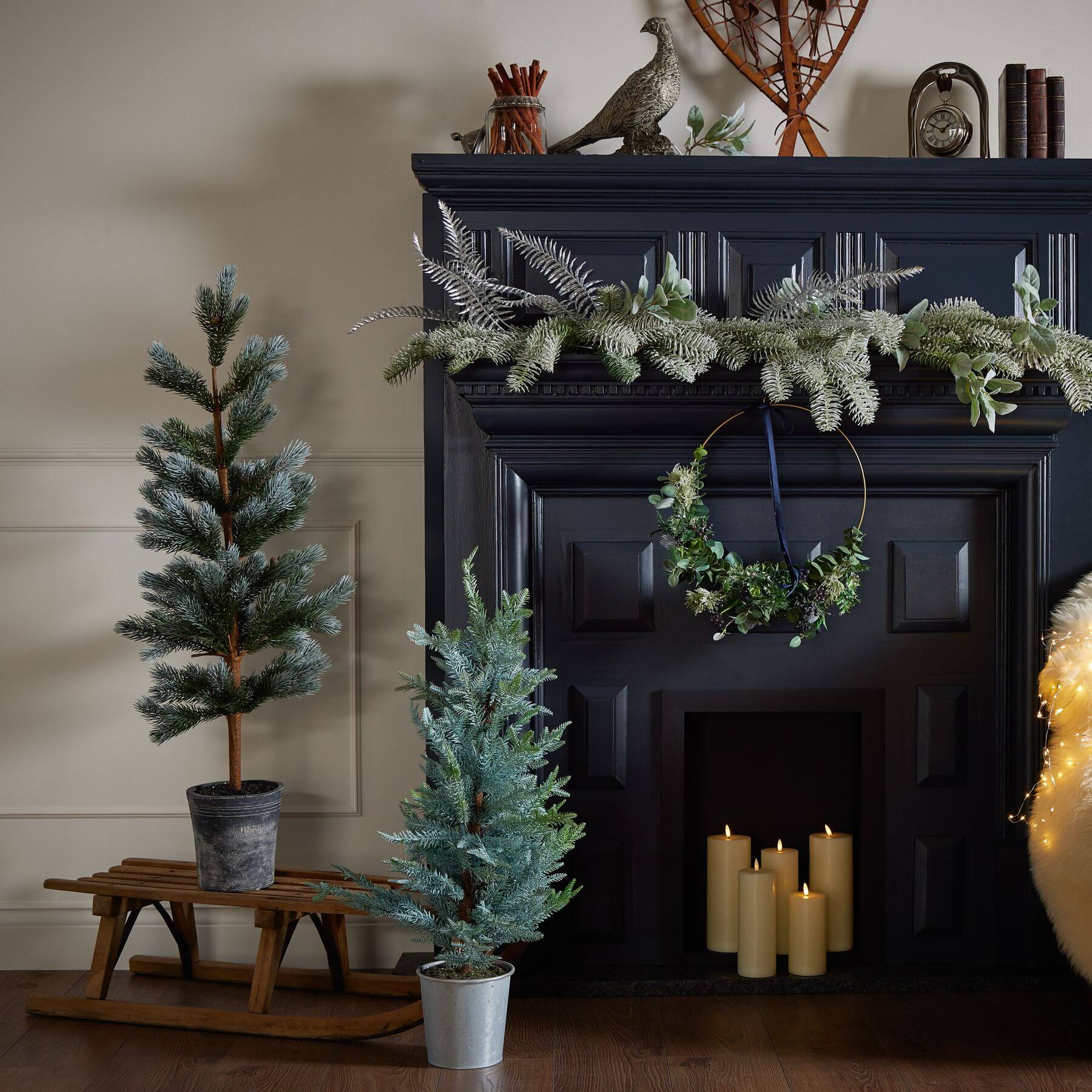 120cm artificial fir tree with lifelike needles and pinecones in natural green, displayed in neutral stone base by Sostter at brixbailey.com